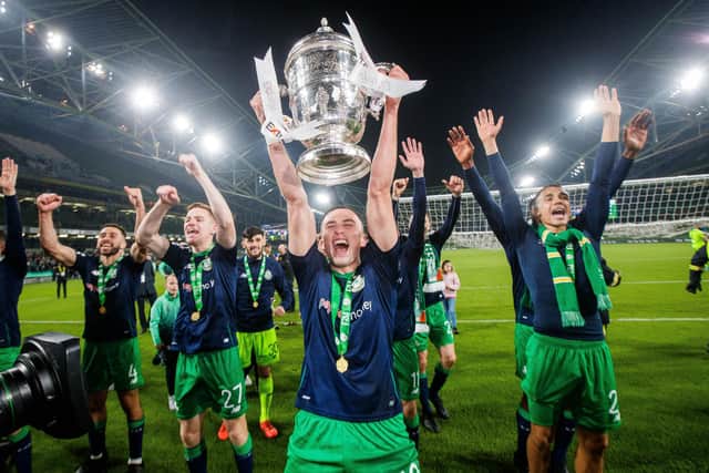 Shamrock Rovers' Aaron McEneff celebrates with the trophy after the 2019 FAI Cup Final.