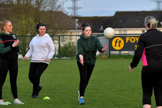 Action from Doire Trasna’s first Mothers and Others football practice session, at Corrody Road. Photo: George Sweeney.  DER2316GS – 19
