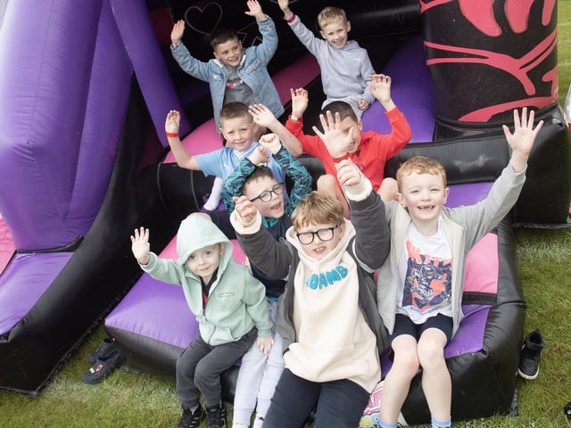 Having fun on the bouncy castles at the Annual Holy Child PS Summer Fair on Friday last.