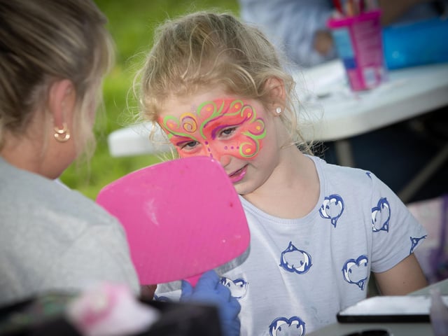 Face-painting time during Tuesday's Feile '25 'Greatest Show' at Abercorn Park, Derry. (Photos: Jim McCafferty Photography) : .