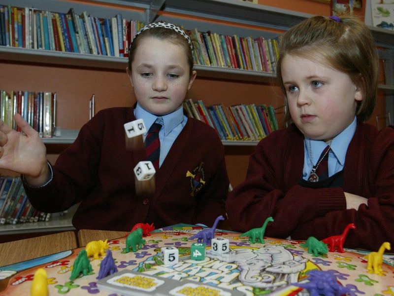 P4 pupils Aileen Quinn and Paula Kelly of St Eithne's OS play a game during their numeracy class.