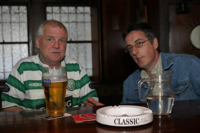 Enjoying a pint at the bar in Tinney's in June 2004.