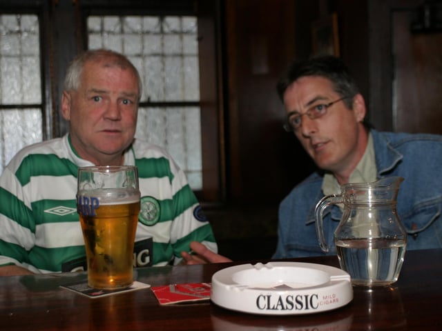 Enjoying a pint at the bar in Tinney's in June 2004.