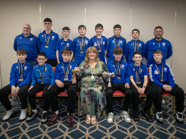 The Deputy Mayor Niree McMorris presenting Oxford United u-14s with their trophies at the Annual D&D Youth FA awards on Friday night. Included are coaches Gary Deery and John Nicholas.. (Photos: Jim McCafferty Photography)