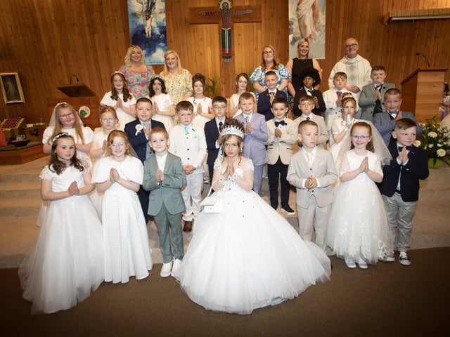 Pupils from Steelstown Primary School who received the Sacrament of First Holy Communion from Fr. McDevitt at Our Lady of Lourdes Church, Steelstown on Saturday last. (Photo: Jim McCafferty Photography)