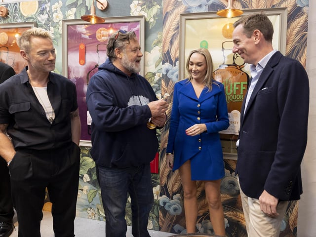 Muff Liquor company founder and CEO, Laura Bonner, with Russel Crowe, Ronan Keating and Ryan Tubridy who are attending the opening of new €1 million Brand Home for The Muff Liquor Company in the village of Muff in Co. Donegal. Company confirms first order of 30,000 bottles for the US market. Photo by Joe Dunne "Free Reproduction"