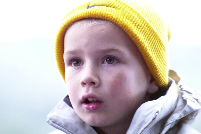 A young fan at the Oasis and Ocean Colour Scene concert in September 2002.