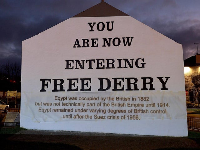 One of the projected images, on Free Derry Corner on Thursday evening, of the British colonial past from the ‘The Sun Never Set And The Blood Never Dries’ art project created by Art Everywhere. The event was part of Bloody Sunday 51 anniversary. Photo: George Sweeney. DER2305GS – 108