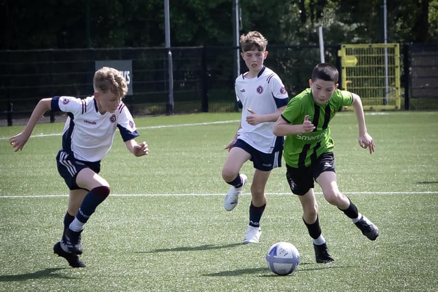 St. Joseph's striker Liam Gallagher storms away from his markers during Thursday's final.