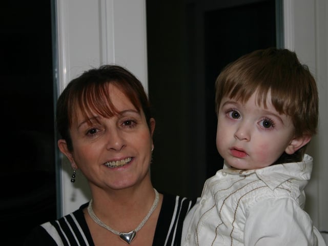 Birthday Boy Oscar with Mum Philly having a good time at the party. 2277/dd : Parties and celebrations January 2006: Oscar Friel.
