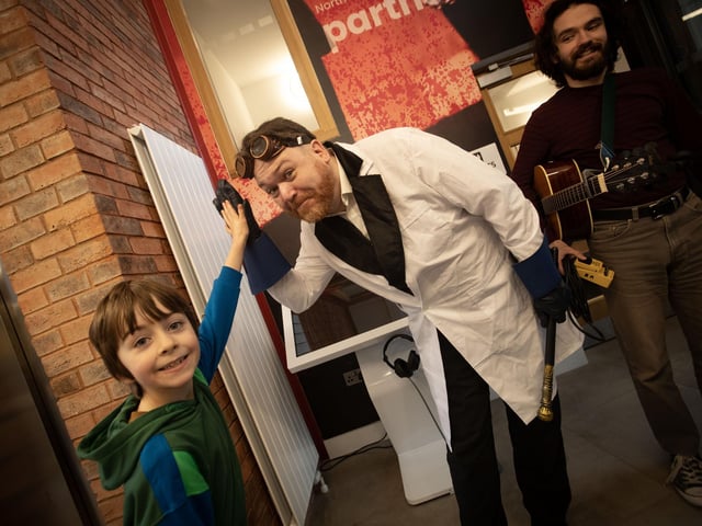 A High Five from young Aidan Carroll for The Mad Scientist (aka Peter E. Davidson) after Saturday's Feile event in New Gate Arts and Culture Centre, Derry.