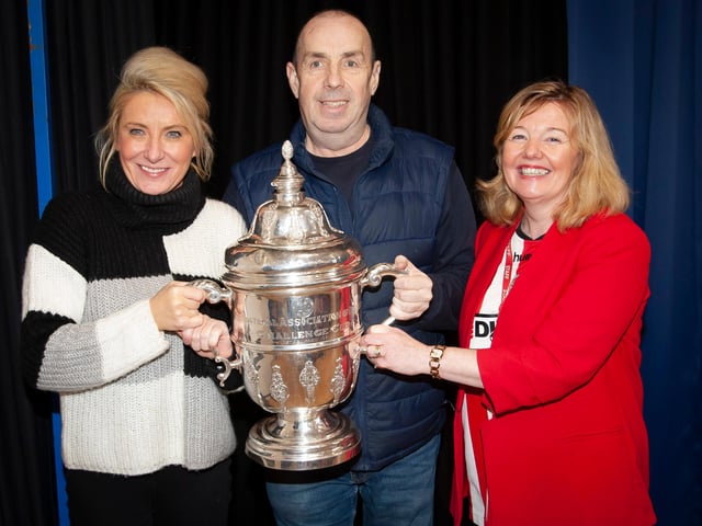 Steelstown Primary School teachers Miss McElhinney, Mr Duffy and Mrs Gillen pictured with the FAI Cup this week. (Photo: Jim McCafferty)