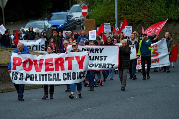 A Derry Against Fuel Poverty march and rally making its way along Duke Street earlier this month. Photo: George Sweeney.