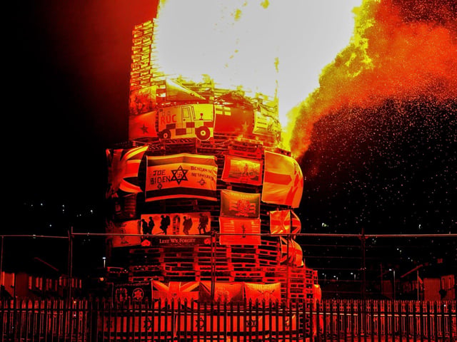 Bonfire alight in the Bogside on Thursday night. Photo: George Sweeney