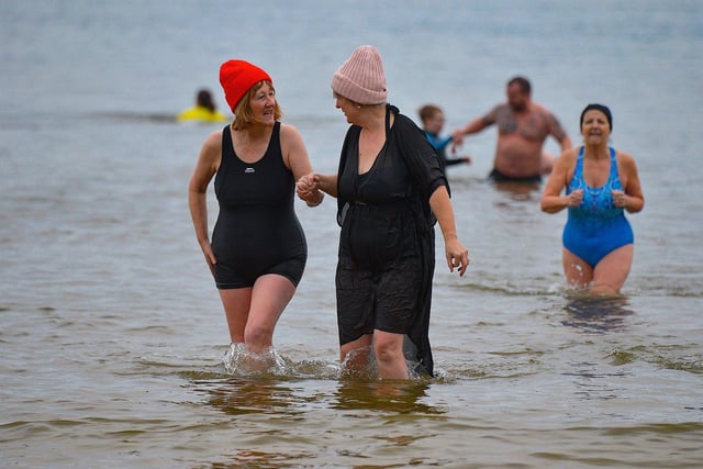 Some of the swimmers taking part in the annual ARC Fitness New Year's Day Charity Swim at Lisfannon beach.  Photo: George Sweeney. DER2301GS  10