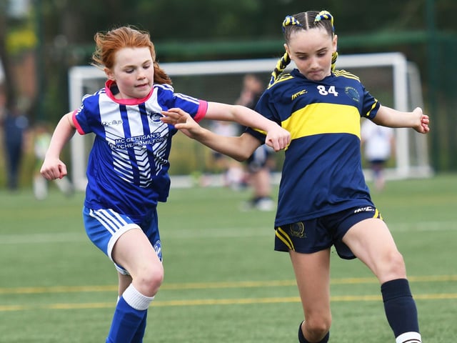 Action from the Girls under-10's match between Don Bosco's and Milford United during the O'Neills Foyle Cup at the Shared Village Centre.
