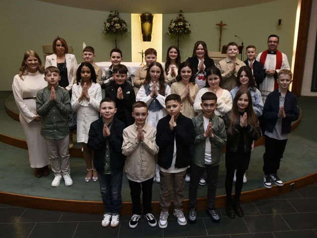 Mrs Mhic Eoin's P7 class at Sacred Heart Primary School who received the Sacrament of Confirmation from Fr. Patrick Lagan at Sacred Heart Church, Waterside on Saturday last. Included is Mrs. Louise Cunning, Principal and Mrs Leanne Mhic Eoin, Class Teacher (Photos: Jim McCafferty Photography)
