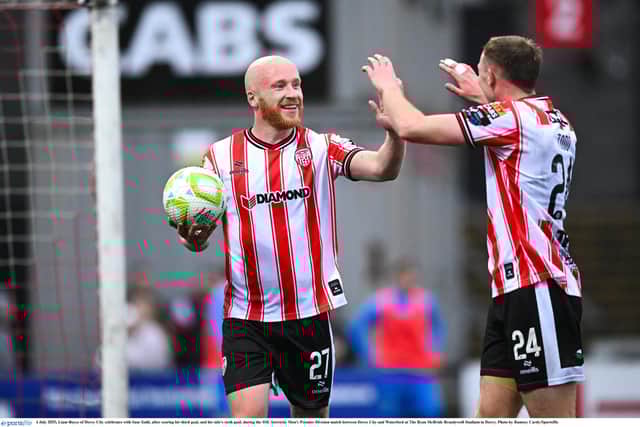 IF IT'S NOT BROKE, DON'T FIX IT! Liam Boyce of Derry City celebrates with Sam Todd, after scoring his third goal against Waterford.
