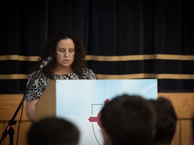 Mrs. Faustina Curran reading the Psalm at St. Joseph's Boys School on Wednesday. : .