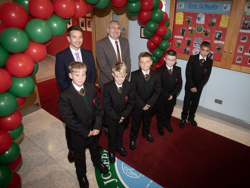 Mr. Paul Quigley and Mr. Gerry Beattie pictured with some of the new Year 8 intake at St. Joseph's on Friday morning.