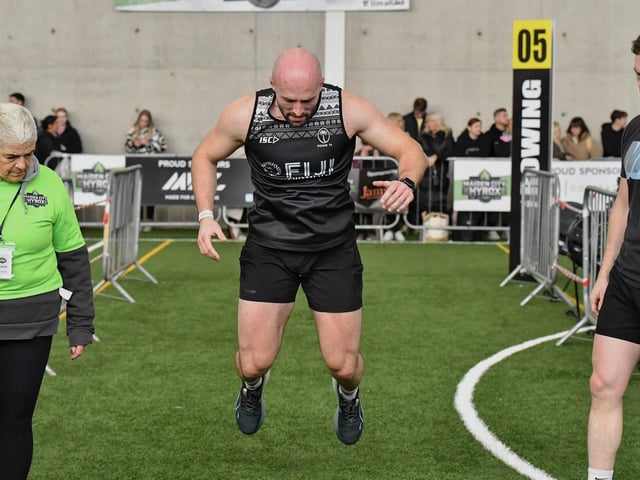 Competitor takes part in the ‘Burpee Board Jumps’ during the Maiden City Hyrox V Fitness Challenge held at Sean Dolans GAC on Saturday.  Photograph: George Sweeney