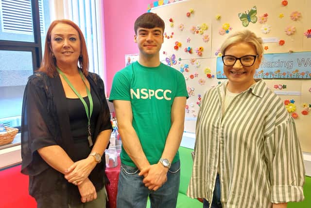 Childline Volunteer Coordinator, Amanda Doherty, YPBC member Markus Smith and Childline Supervisor, Sunneva Callan Bjerkaker in the Childline Foyle base