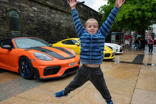Leon Irwin (6) from Derry. Derry City and Strabane District Council Mayor, Councillor Lilian Seenoi-Barr has hosted Supercar Saturday in Guildhall Square to raise money for the Mayoral Charity Bud Club. The event attracted car enthusiasts and owners from across the region to support aid the local charity. Picture Martin McKeown. 24.05.25