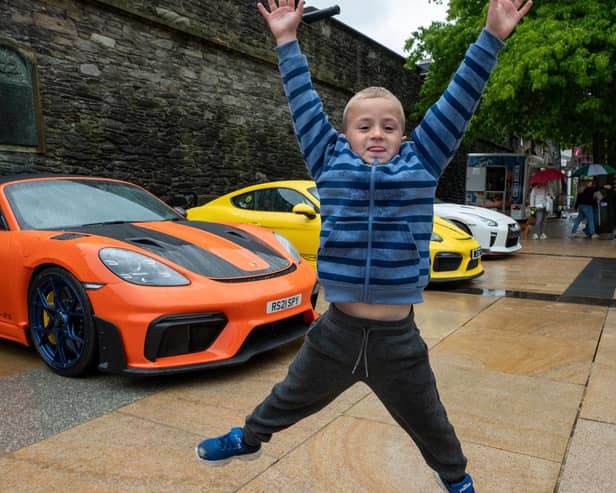 Leon Irwin (6) from Derry.  Derry City and Strabane District Council Mayor, Councillor Lilian Seenoi-Barr has hosted Supercar Saturday in Guildhall Square to raise money for the Mayoral Charity Bud Club. The event attracted car enthusiasts and owners from across the region to support aid the local charity. Picture Martin McKeown. 24.05.25