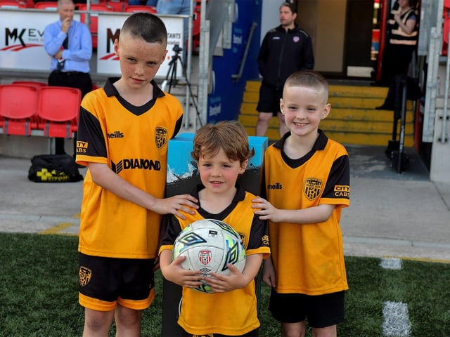 Brothers and candystripes fans at the Ryan McBride Brandywell Stadium for the Derry City versus Bohemian game on Friday evening. Photo: George Sweeney. DER2322GS – 140