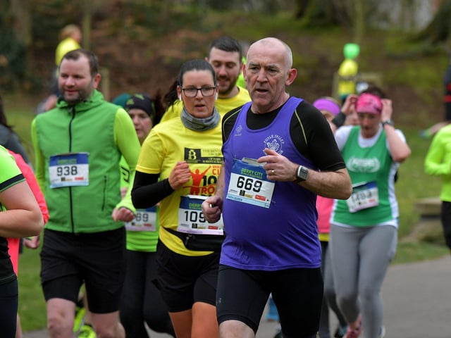 Runners make their way through St Columb’s Park during the Bentley Group Derry 10 Miler road race on Saturday morning. Photo: George Sweeney. DER2310GS – 106