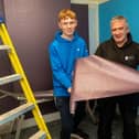 Cormac McVeigh finds out about Painting and Decorating courses at NWRC Springtown from Sean Barton, lecturer.