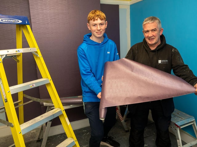 Cormac McVeigh finds out about Painting and Decorating courses at NWRC Springtown from Sean Barton, lecturer.