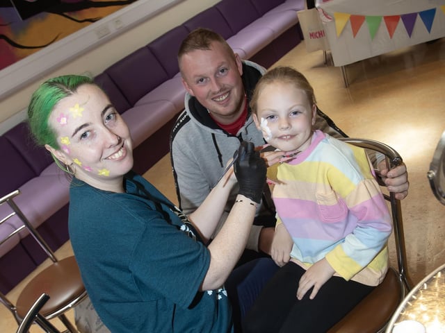 Facepainting for this young lady as dad watches on during the Feile '25s Party in the Park (Big Bog BBQ) in Pilot's Row on Saturday. (Photos: Jim McCafferty Photography) : .