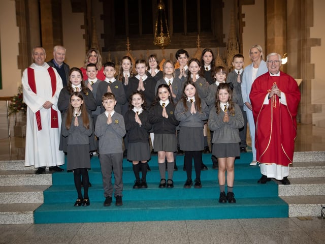 MODEL PS CONFIRMATION. . . . .Pupils from the Model Primary School who received the Sacrament of Confirmation from Fr. Colum Clerkin at St. Eugene's Cathedral on Thursday last. Included in photo is Fr. Paul Farren, Ms. Julie O'Loughlin, Principal and P7 teachers Mr. Morrison and Ms. Coyle (Photo: Jim McCafferty Photography)