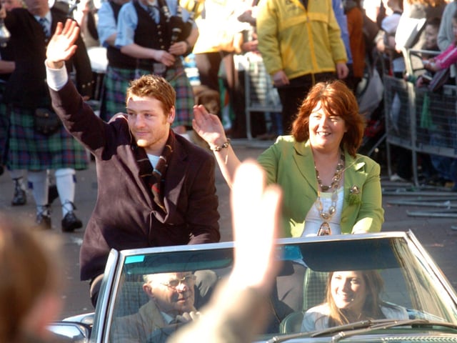 Derry Boxer, John Duddy and the Deputy Maor of Derrry, Councillor Patricia Logue lead the annual St Patrick's Day parade. (1803SL06)