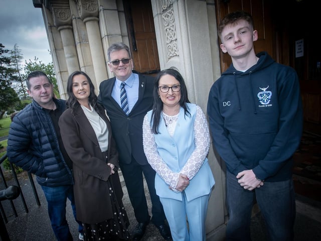Mrs. McLaughlin and Mr. Chambers pictured with Year 14 student Aaron Concannon and his parents before Thursday's Valedictory Mass. : .