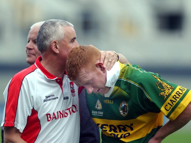 Derry manager Mickey Moran consoles midfielder Fergal Doherty at the final whistle in Croke Park.