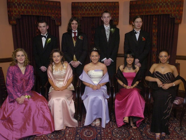 Seated, from left, Bria Murphy, Eimear McAteer, Noreen Bradley, Louise Hutchinson, and Andrea Hegarty. Standing, from left, Gerard McLaughlin, Kyle Doherty, Edward McGrath, and Ben O'Hagan. (1801PG13) : Scoil Mhuire Formal in January 2005.