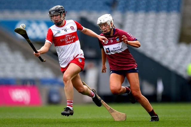 Derry’s Megan Kerr gets asway from Maria Kelly of Westmeath during Sunday's Very Camogie League Division 2A Final in Croke Park. (Photo: INPHO/Ryan Byrne)