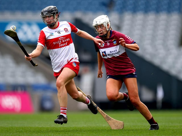 Derry’s Megan Kerr gets asway from Maria Kelly of Westmeath during Sunday's Very Camogie League Division 2A Final in Croke Park. (Photo: INPHO/Ryan Byrne)