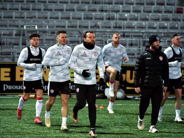 Derry City players Adam O' Reilly, Danny Mullen and Paul McMullan and Strength and Conditioning coach Danny Doherty.Photograph: George Sweeney