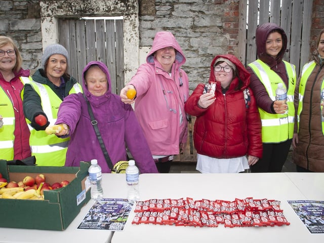 FDST volunteers and walkers get some refreshments for Ruby’s Walk on Saturday at Ebrington Square.