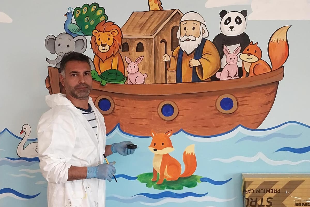 Portrush church thanks Derry-based Iranian asylum seeker whose artistic talents have put smiles on little faces