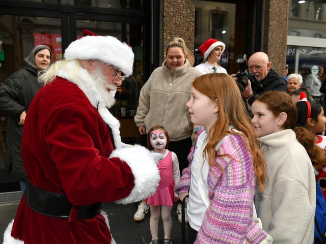 Santa arrives at the Richmond Shopping Centre on Saturday morning. Photo: George Sweeney