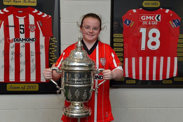 Derry City fan Sophia Redden pictured with the FAI Cup at the Ryan McBride Brandywell Stadium.