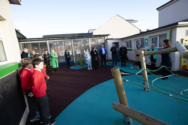 Principal, Mrs Carol Duffy introduces the visitors to the newly-constructed playground on the Infant Site at St. Eugene's on Monday.