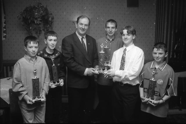 John Friel, chairman, County Donegal GAA Minor Board, presenting the underage Player of the Year Awards at the Malin G.F.C. dinner held in the Malin Hotel. From left are Patrick McColgan, Damien Harkin (joint winners U-12 'A'), William Grant (U-14), Thomas Brown (U-16) and Martin Kelly (U-12 'B').