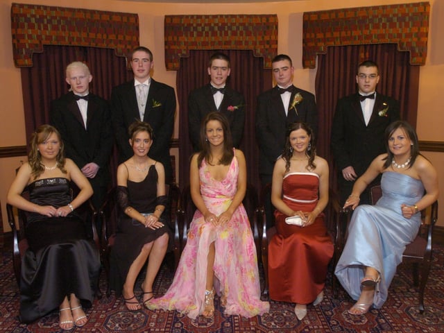 Seated, from left, Rosemary Harkin, Rosemary Moloney, Nicola McLaughlin, and Breid Devlin. Standing, from left, Conor Fullerton, Gary McLaughlin, Peter Hegarty, Stephen Porter, and Dwayne Hardy. (1801PG05) : Scoil Mhuire Formal  in January 2005.