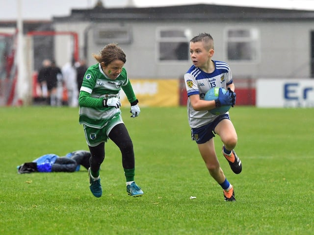 Young footballers from Faughanvale and Ballinderry playing during the SFC final interval at Celtic Park on Sunday afternoon. Photo: George Sweeney