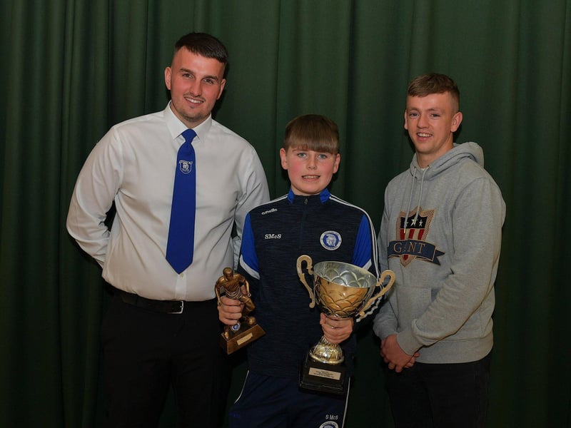 Trojans FC Hall of Fame award winner Seamus McShane pictured at the club’s annual prizegiving with Diolain Ward Vice- Chairperson and Derry City’s Ciaron Harkin. Photo: George Sweeney